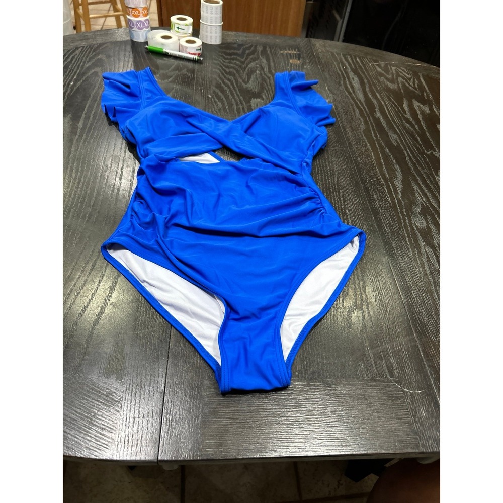 blue swimsuitโ